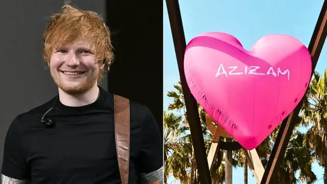 Ed Sheeran, znany z wielu hitów i albumów, uśmiecha się obok różowego balonu w kształcie serca z napisem "AZIZAM".